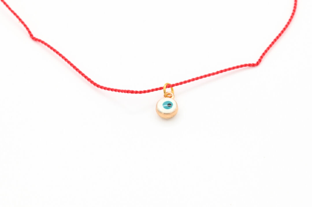 2000000015699-collier-fil-de-soie-rouge---oeil-grec